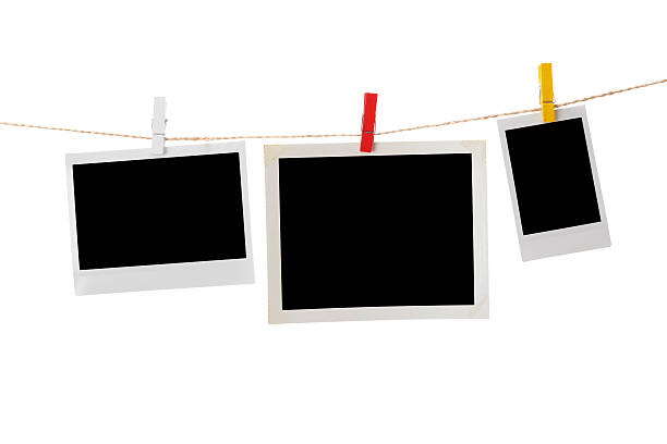 istock Blank instant photo prints hanging on washing line 174753080