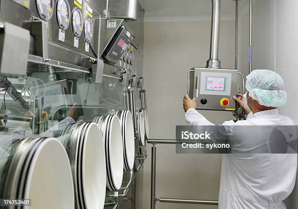 Pharmacy Technician Set Glove Box Machine Stock Photo - Download Image Now - Machinery, Automated, Diagnostic Medical Tool