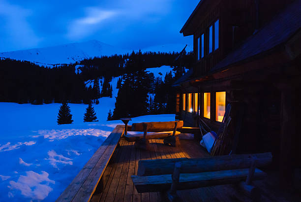 istock Backcountry Hut in Mountains Glowing at Night 174753836