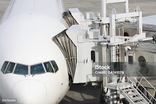 Airplane At Airport Stock Photo - Download Image Now - Airport, Boarding, Ramp