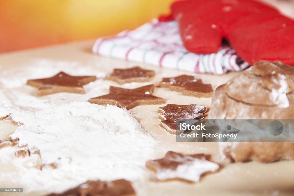 Homemade Christmas cookies Home making Christmas cookies.  Cutting various shapes of gingerbread cookies with mold. Adult Stock Photo