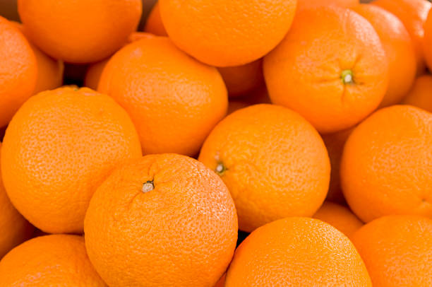 Heap of fresh and beautiful oranges.
