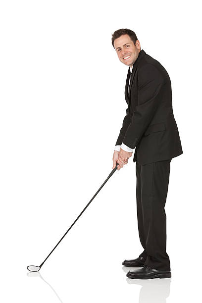 istock Attractive young businessman playing golf 174755084