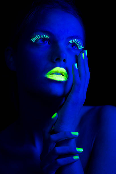 istock Women Portrait with Lime Green Fingernails in Neon Light 174755195