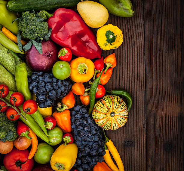 istock Fruits and vegetables on wood table 174756363