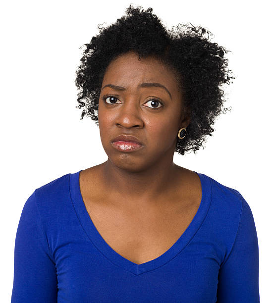 istock Unhappy Young Woman Looking At Camera 174756597