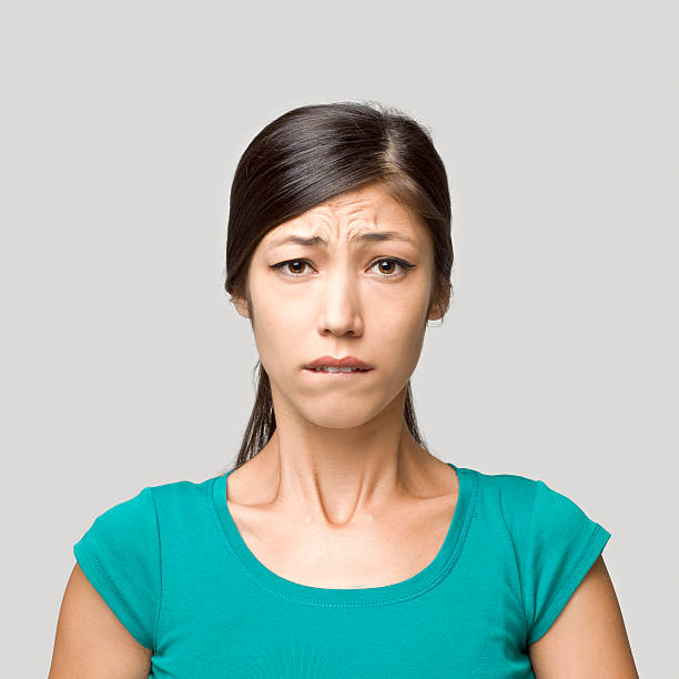 istock Young woman making a frightened face expression 174756630