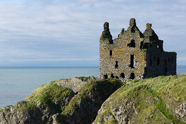 istock Ruined Castle looking out to sea on the cliffs. 174757067