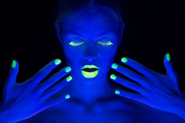 istock Women Portrait with Lime Green Fingernails in Neon Light 174757363
