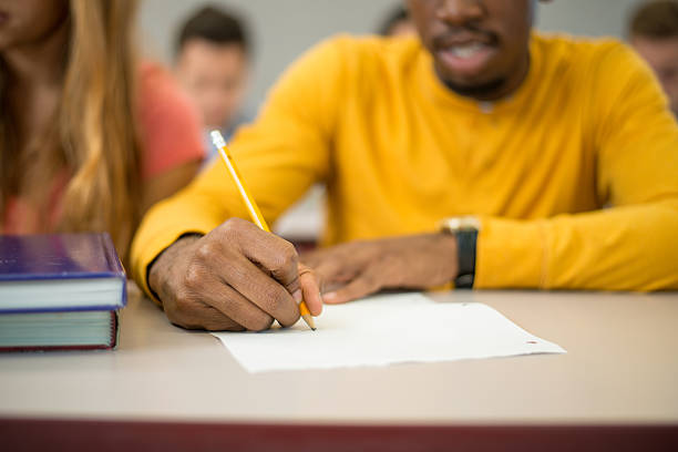istock College kids in classroom. 174757497