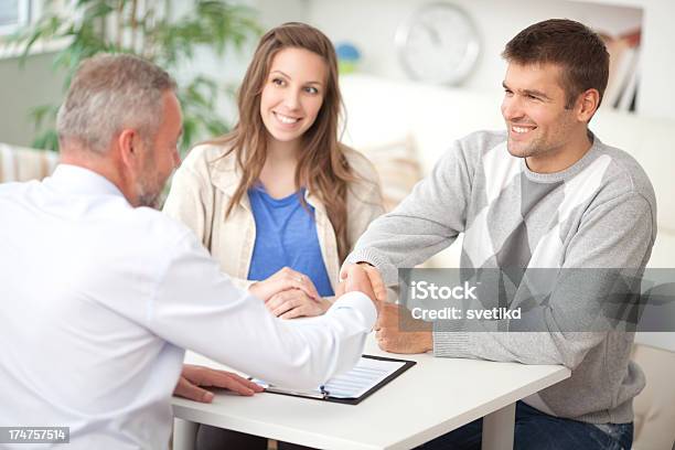 Couple With Consultant Stock Photo - Download Image Now - 50-59 Years, Adult, Adults Only