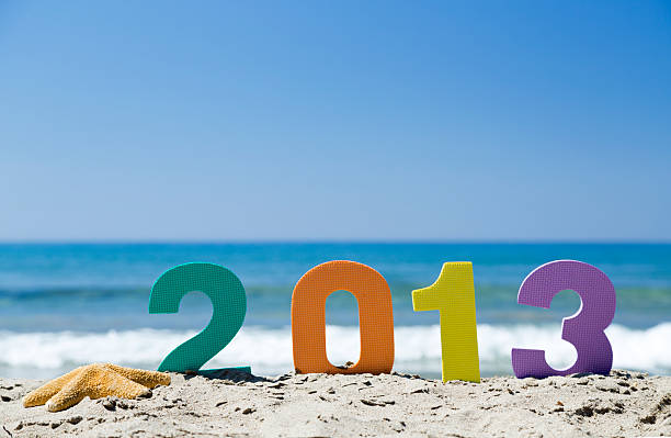 novo ano 2013 - 2013 beach sand new years day imagens e fotografias de stock