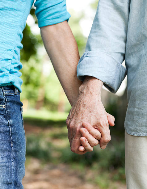 istock Senior Couple Holding Hands 174757787