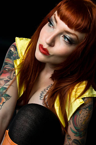 istock Retro Goth Tattoo Female Model With Orange Hair 174757798