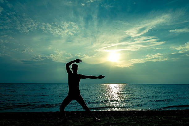 man and sunset on the sea