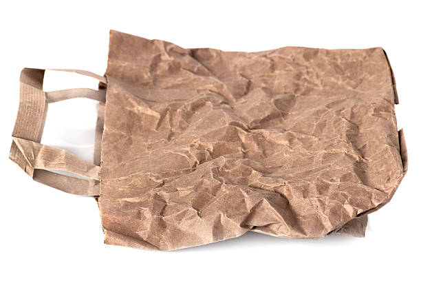 istock Wrinkled empty brown paper lunch bag 174758174