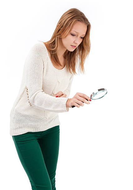 若い女性、虫眼鏡 - low scale magnification glass women holding ストックフォトと画像