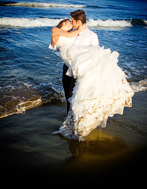 istock Newlywed couple in the sea 174759979