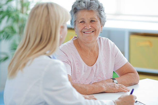 istock Senior woman at doctor's office. 174759987