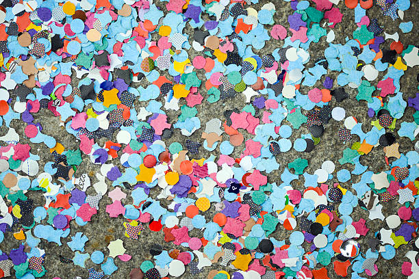 Confetti on sidewalk during Italian carnival