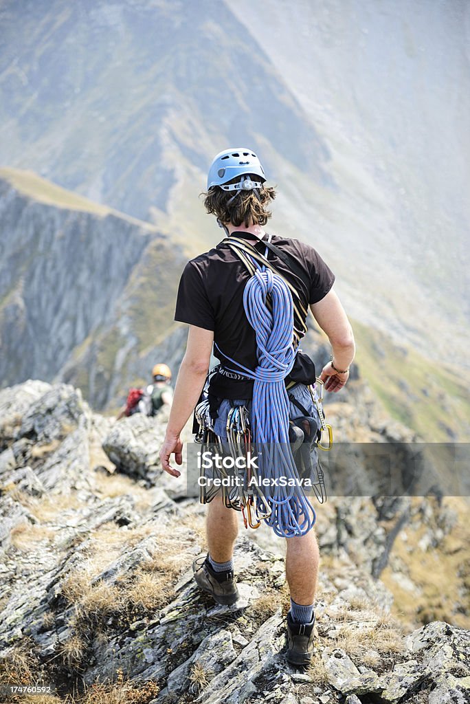 mountaineer absteigender die Berge - Lizenzfrei Aktiver Lebensstil Stock-Foto