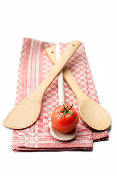 istock tomatoe and cooking utensils 174760787