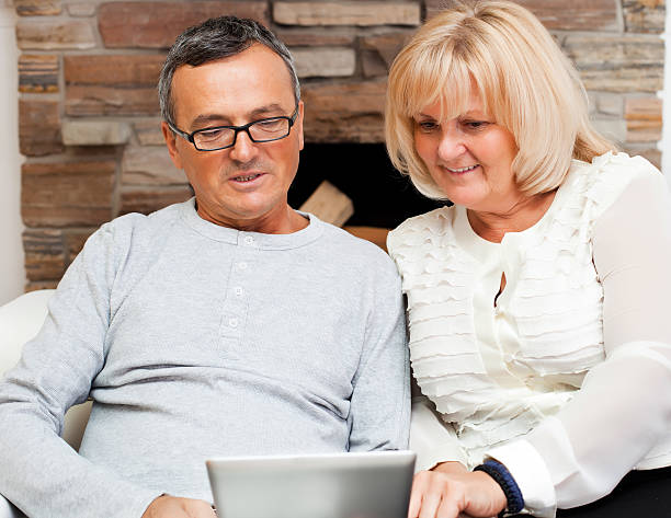 istock Happy mature couple with a digital tablet 174761537