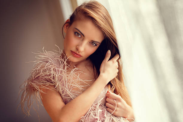 istock girl by the window 174762467