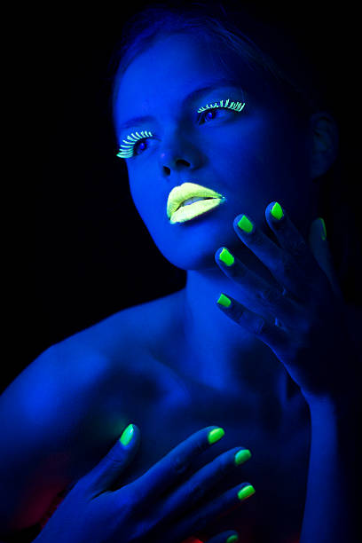istock Women Portrait with Lime Green Fingernails in Neon Light 174762524