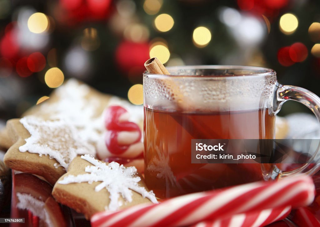 Christmas table with cookies and warm tea christmas table Hot Apple Cider Stock Photo