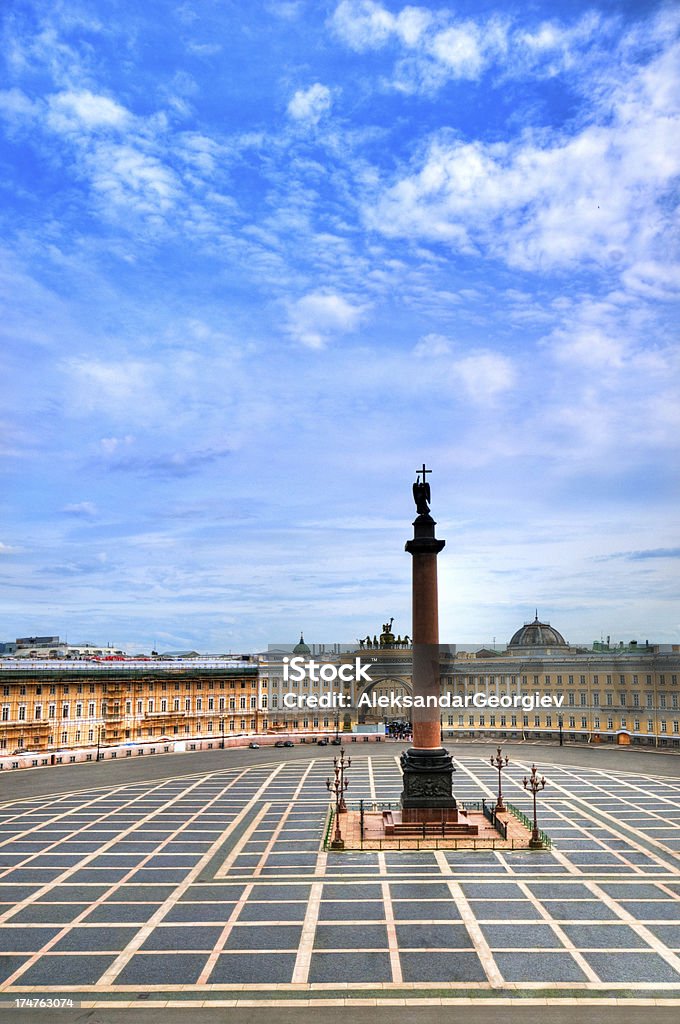 Alexander Column and Palace Square "The Alexander Column monument is the focal point of empty Palace Square in Saint Petersburg, Russia. It was designed by the French-born architect Auguste de Montferrand, built between 1830 and 1834.See more images like this in:" St. Petersburg - Russia Stock Photo