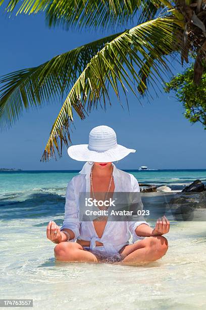 Women Meditating Stock Photo - Download Image Now - 25-29 Years, 30-34 Years, 30-39 Years