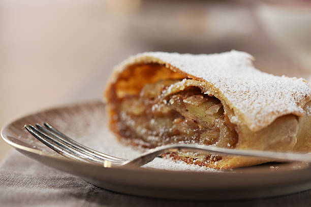 apple strudel Traditional austrian cake made with thin pastry and apples apple strudel stock pictures, royalty-free photos & images