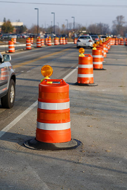istock Cars running through orange barrel zone. 174764556