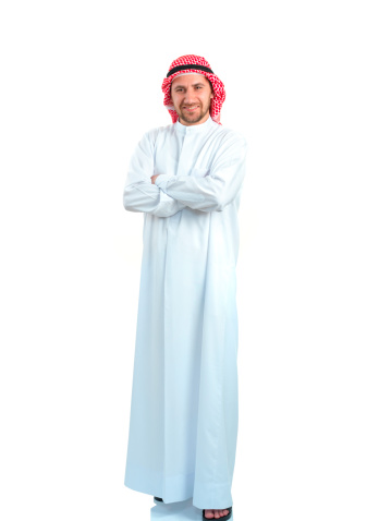 Arabian young adult man is posing at camera.