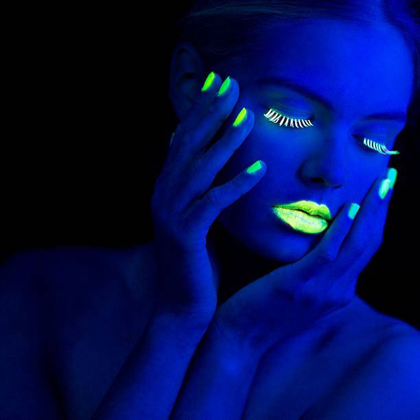 istock Women Portrait in Neon Light with Lime Green Fingernails 174764879