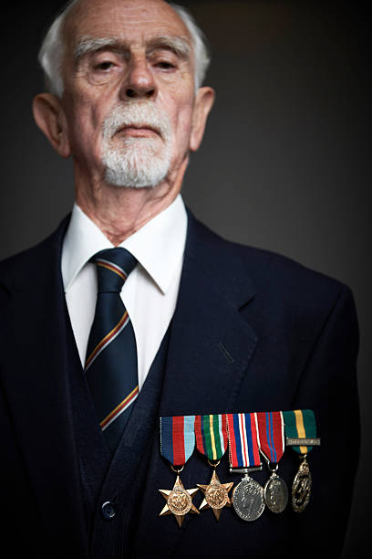 istock Studio Portrait Of Senior Man Wearing Medals 174765011