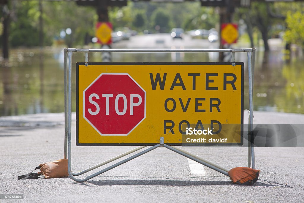 Água sobre Placa de estrada - Foto de stock de Austrália royalty-free