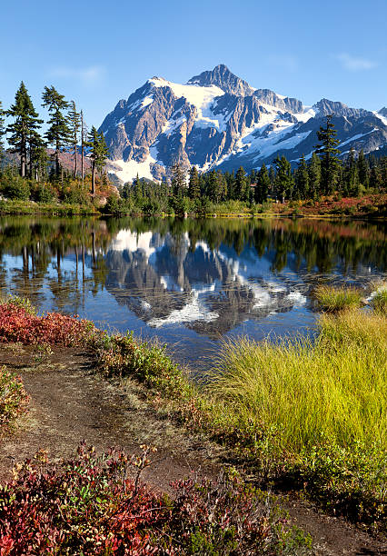 Beauty in Nature Mt Shuksan in Washington state in late autumn - Picture Lake in foreground. picture lake stock pictures, royalty-free photos & images