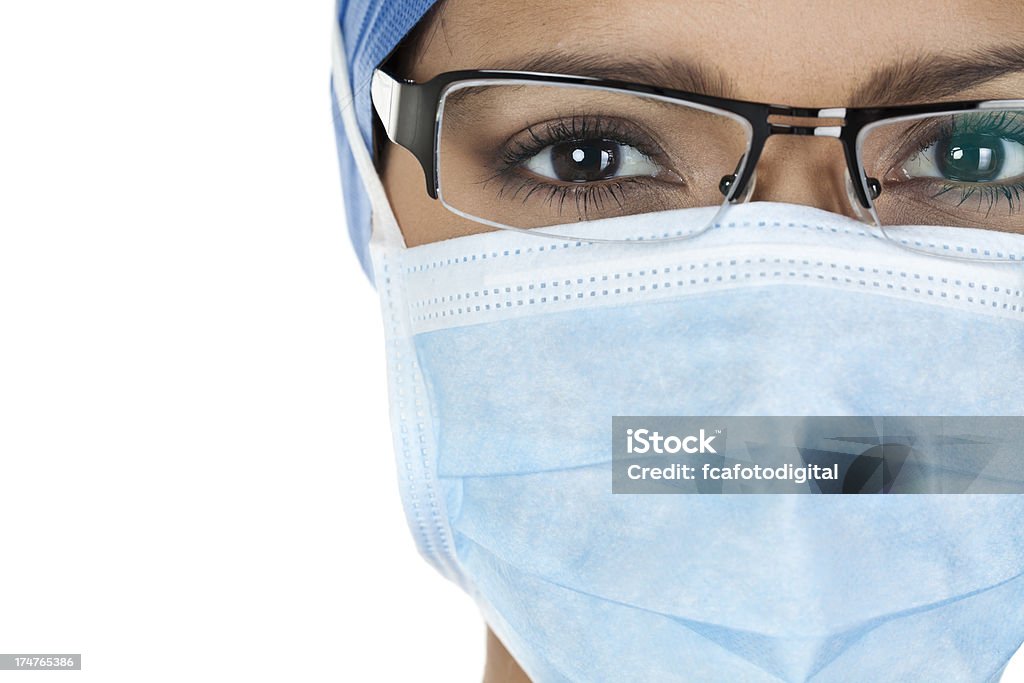 Close Up of Female Doctor Close Up of Female Doctor or Surgeon Looking at Camera Adult Stock Photo
