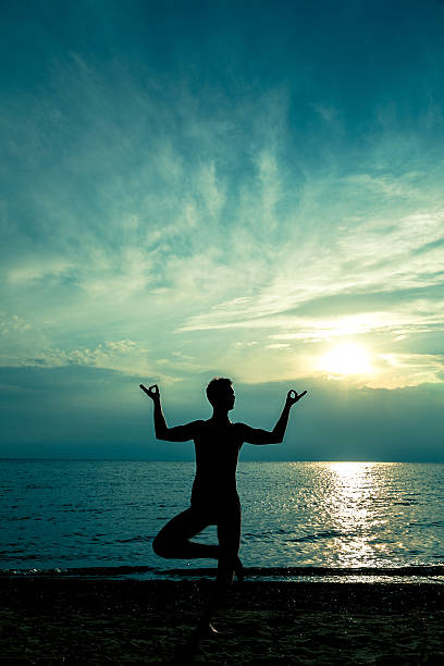 istock man and sunset on the sea 174765395