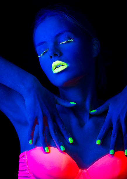 istock Women Portrait with Lime Green Fingernails in Neon Light 174765627