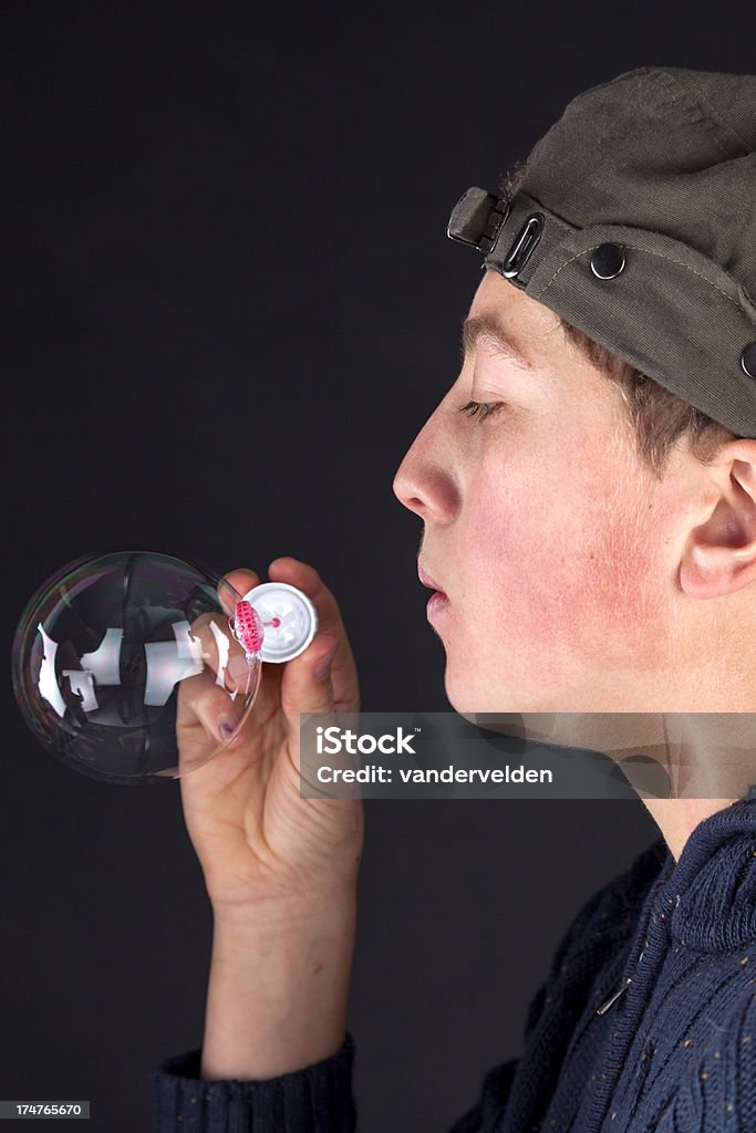 Teenage Boy enviar un de pensamiento - Foto de stock de 14-15 años libre de derechos