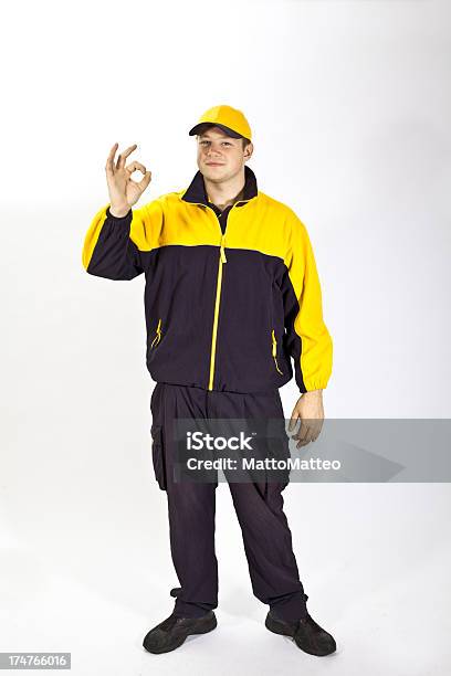 Young German Postman In A Uniform Stock Photo - Download Image Now - Germany, Postal Worker, Adult