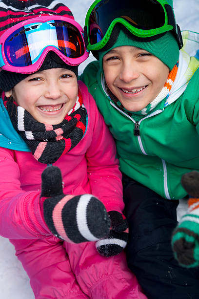 istock Young sibling snowboarder portrait 174766771