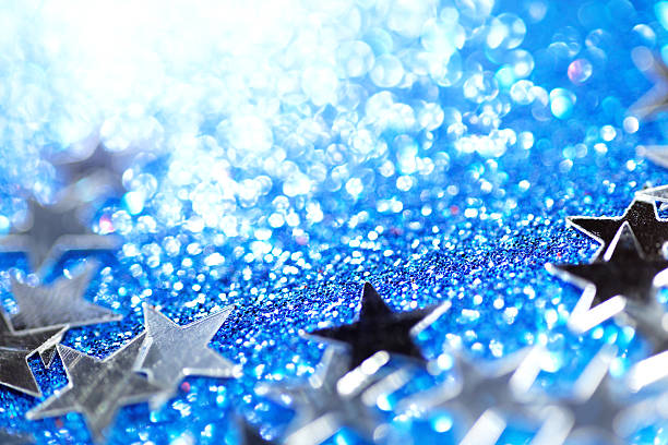 silver stars on blue glittering background