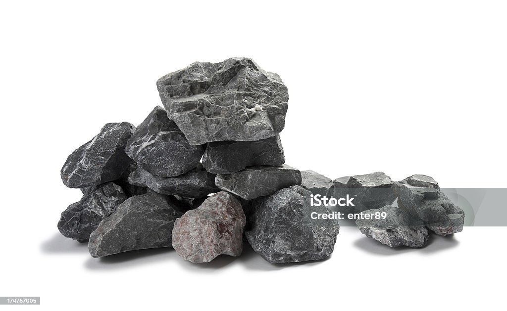 Closeup of a limestone chippings on white background Limestone chippings Rock - Object Stock Photo