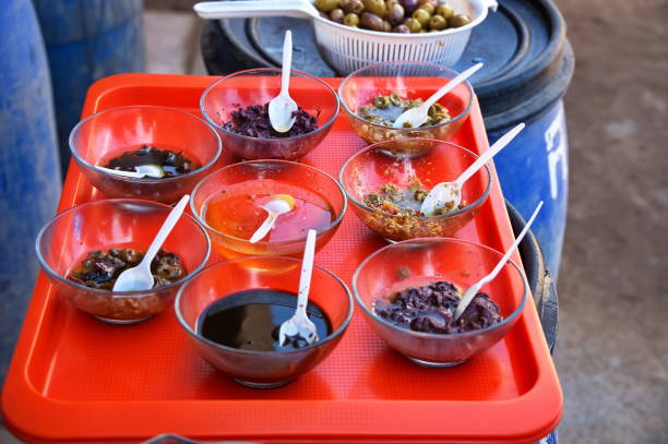 Olive products for taste on market in Peru