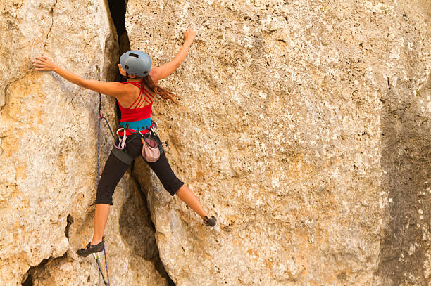 istock Woman rockclimbing 174768077