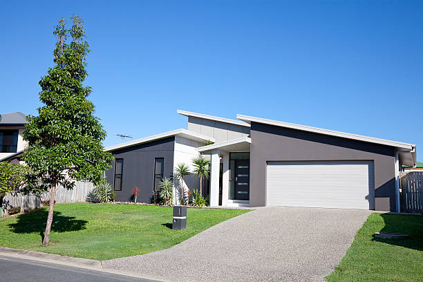 istock Family Home Front with blue sky 174768096